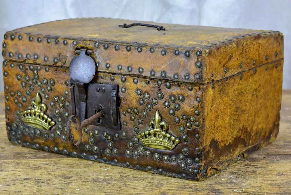 17th Century leather and wooden storage chest with key
