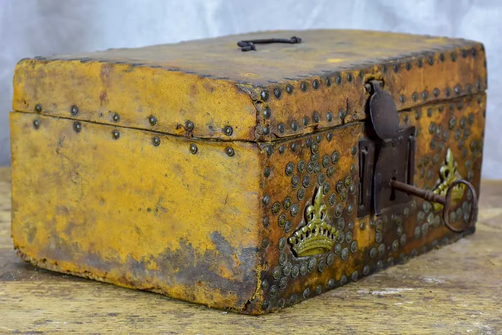 17th Century leather and wooden storage chest with key
