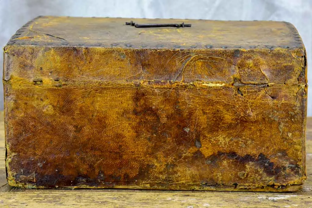 17th Century leather and wooden storage chest with key