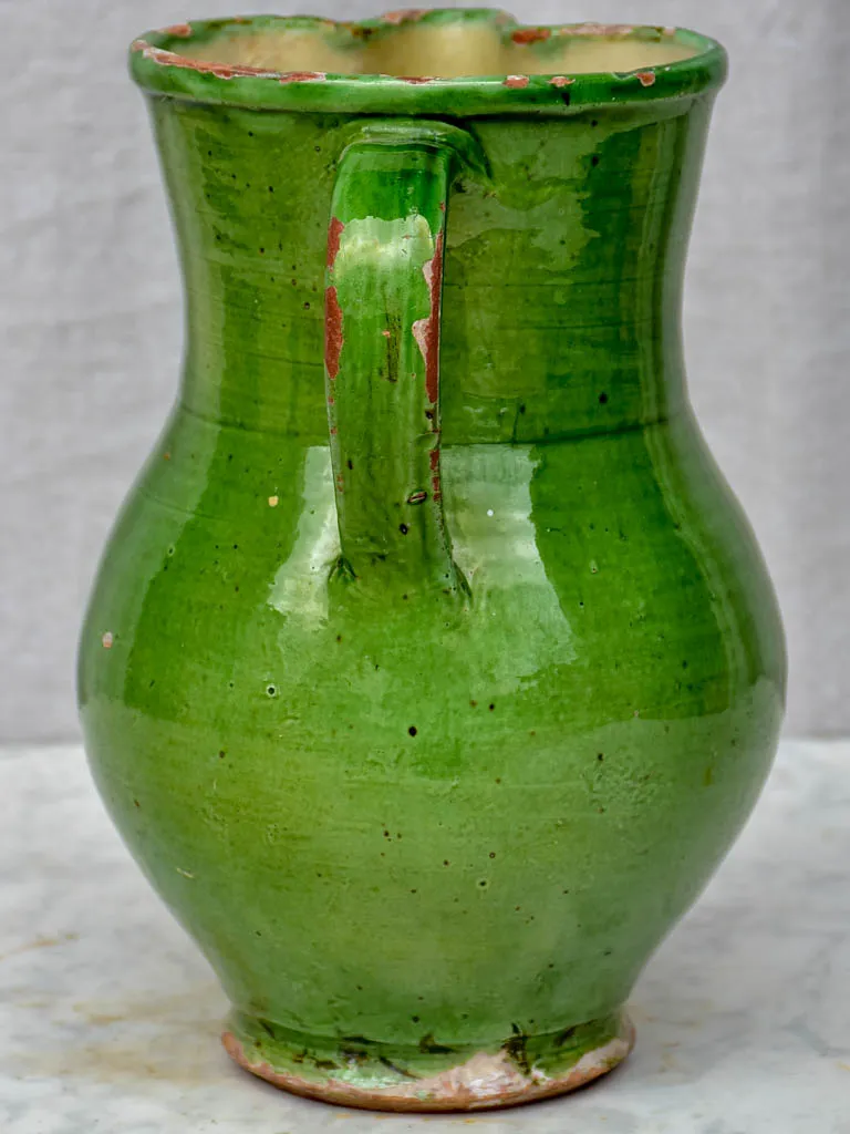 Antique French pitcher with green glaze